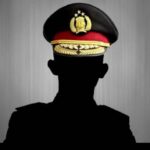 Silhouette of a person in a formal uniform wearing a peaked cap with an emblem, against a gray background.