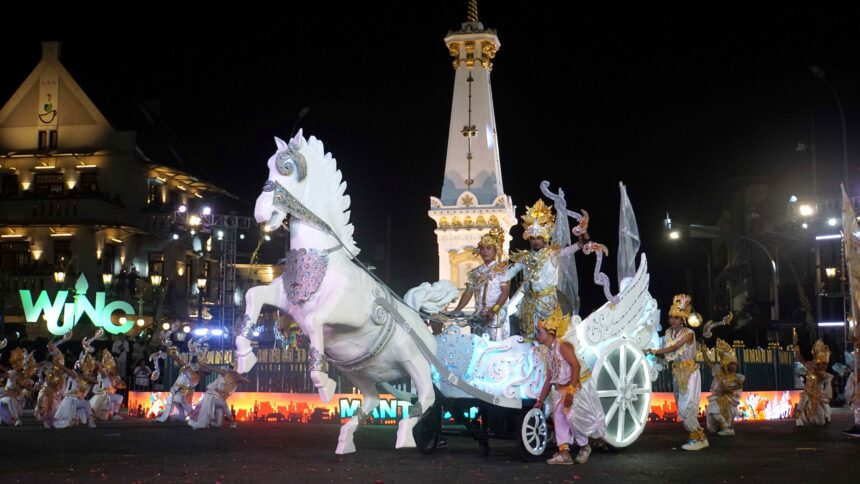Nighttime parade scene with an ornate white horse float and performers in gold-white costumes under bright streetlights