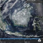 Interactive satellite map screenshot from NASA Worldview showing Earth’s surface with cloud patterns over Southeast Asia and Australia; left panel shows layer controls, bottom timeline from July to August 2026, and scale/coordinate indicators visible on the right.