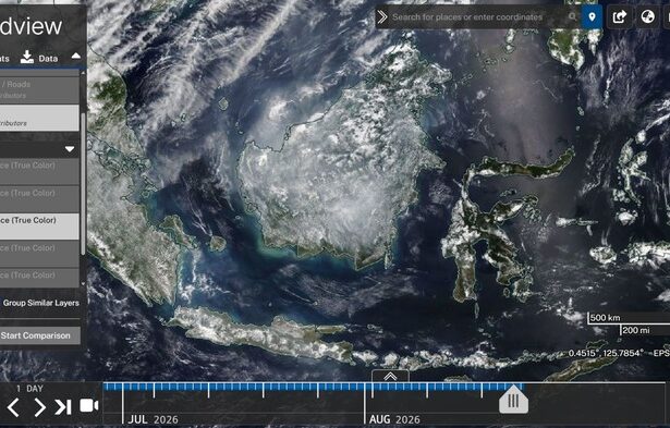 Interactive satellite map screenshot from NASA Worldview showing Earth’s surface with cloud patterns over Southeast Asia and Australia; left panel shows layer controls, bottom timeline from July to August 2026, and scale/coordinate indicators visible on the right.