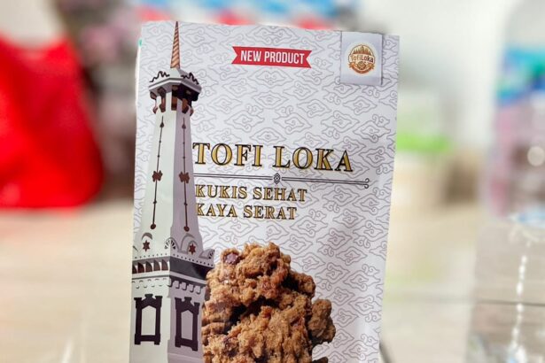 Product packaging for 'TOFI LOKA' healthy-fiber cookies, featuring a tall tower illustration on the left and a cluster of fried cookies in the foreground.