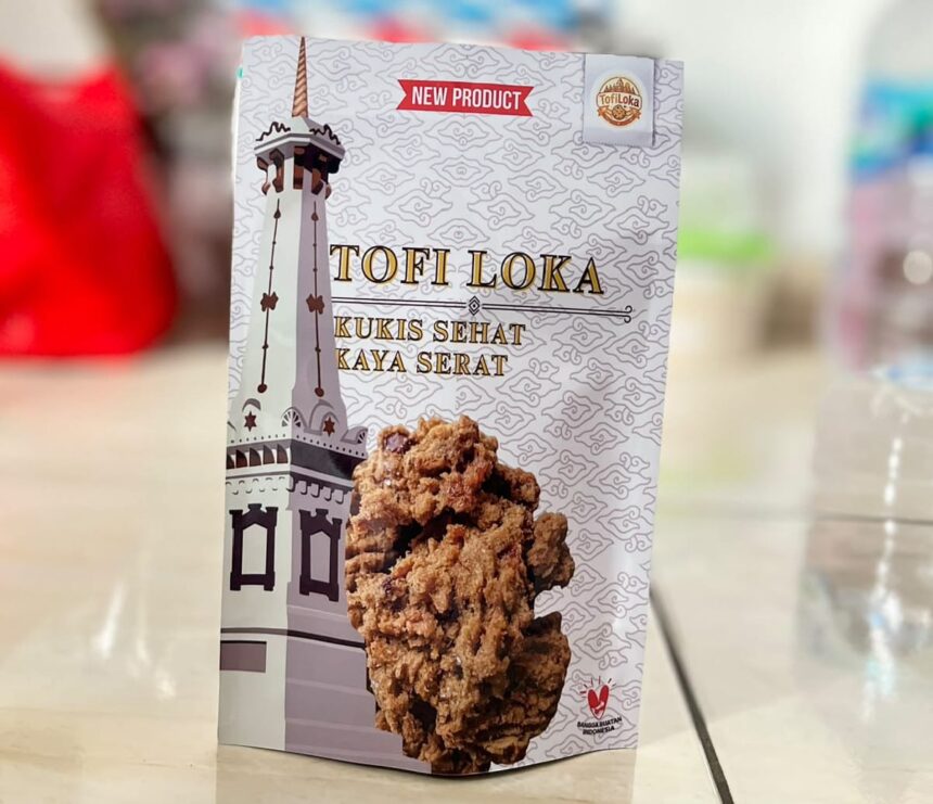 Product packaging for 'TOFI LOKA' healthy-fiber cookies, featuring a tall tower illustration on the left and a cluster of fried cookies in the foreground.