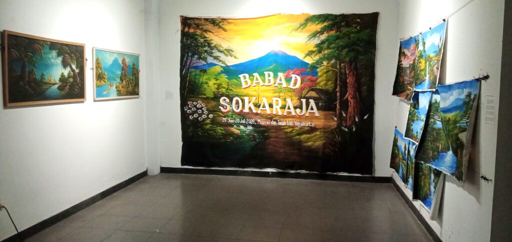 Large colorful landscape banner in a gallery reading 'BABAD SOKARAJA' with dates and location text on the bottom.