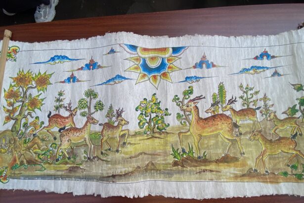 Colorful painted banner showing a forest scene with many deer and a large decorative sun at center-right.