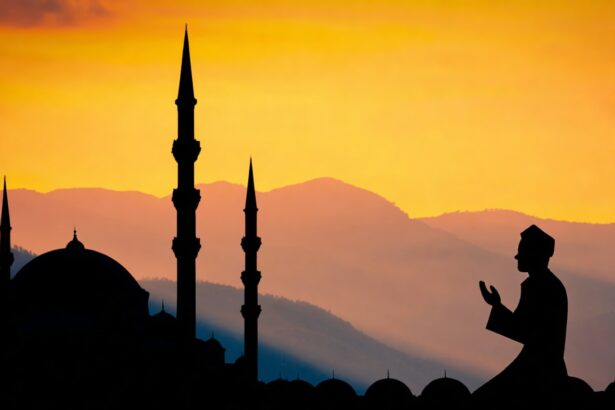 Silhouetted mosque with domes and tall minarets at sunset, a praying figure in the foreground.