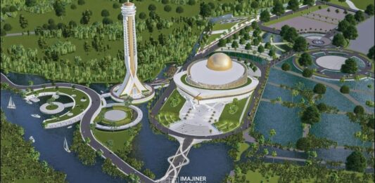 A futuristic park with a tall observation tower, a domed central building, and winding bridges over water; a science-arts complex in a green landscape.