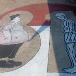 Mural on pavement showing a rotund man with a pink cape facing a tall, skeletal figure across a curved white path.