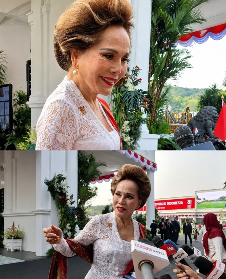 Woman in white lace dress being interviewed by reporters at an outdoor formal event.