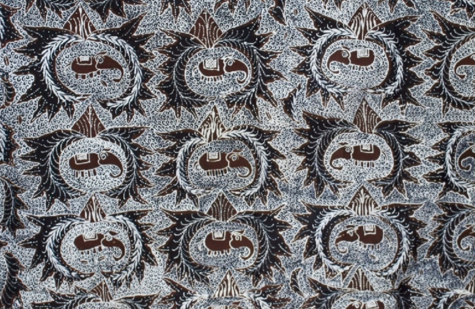 Screenshot_20260929_003123_WPS Office - Mabur.co Decorative fabric pattern featuring repeating circular sunburst medallions with elephant silhouettes in brown and white.