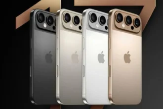 Row of four iPhones with triple-camera backs in black, silver, gold, and rose gold colors, logo visible on each device.