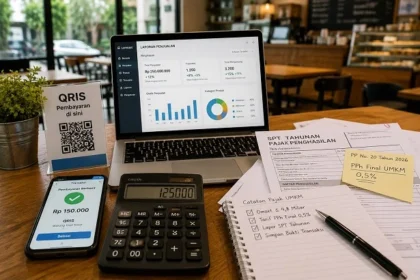 Laptop shows a financial dashboard with charts; a calculator, smartphone with a QRIS payment screen, and tax documents on a wooden desk.