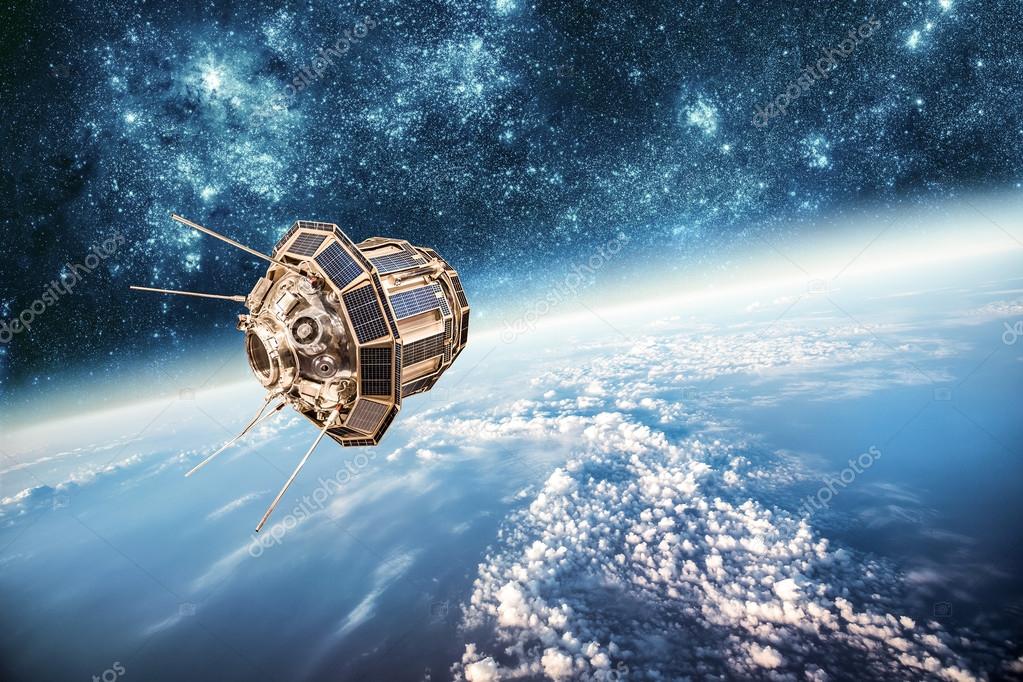 Satellite in space above Earth with a starry background, showing solar panels and antennas.