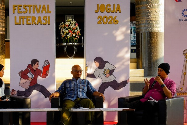 Panel discussion at Jogja 2026 Literasi Festival with three speakers seated on stage.