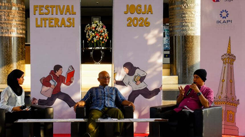 Panel discussion at Jogja 2026 Literasi Festival with three speakers seated on stage.