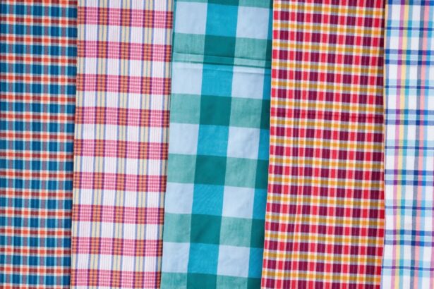 Six vertical strips of plaid fabric in blue, red, teal, yellow, and purple checks.