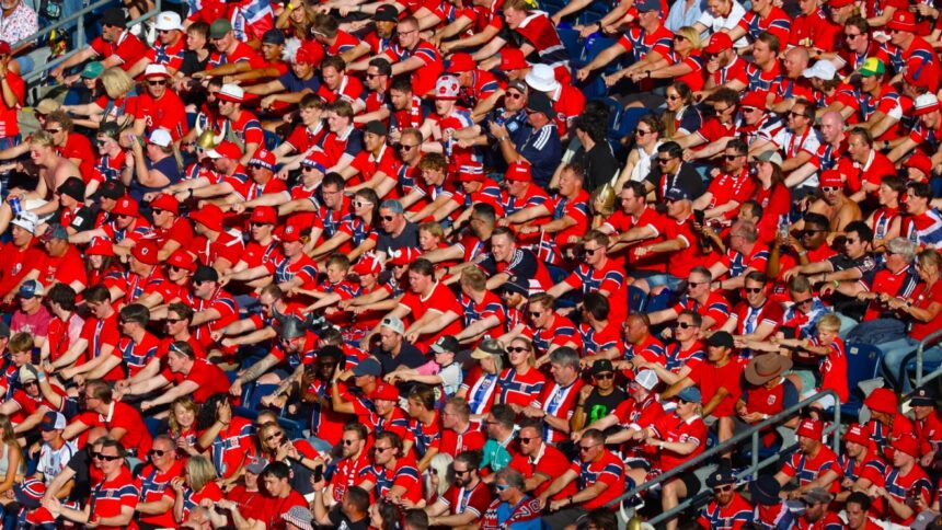 viking row norway by indianexpress com - Mabur.co Large crowd of sports fans in red, seated in stadium stands and cheering at a game.