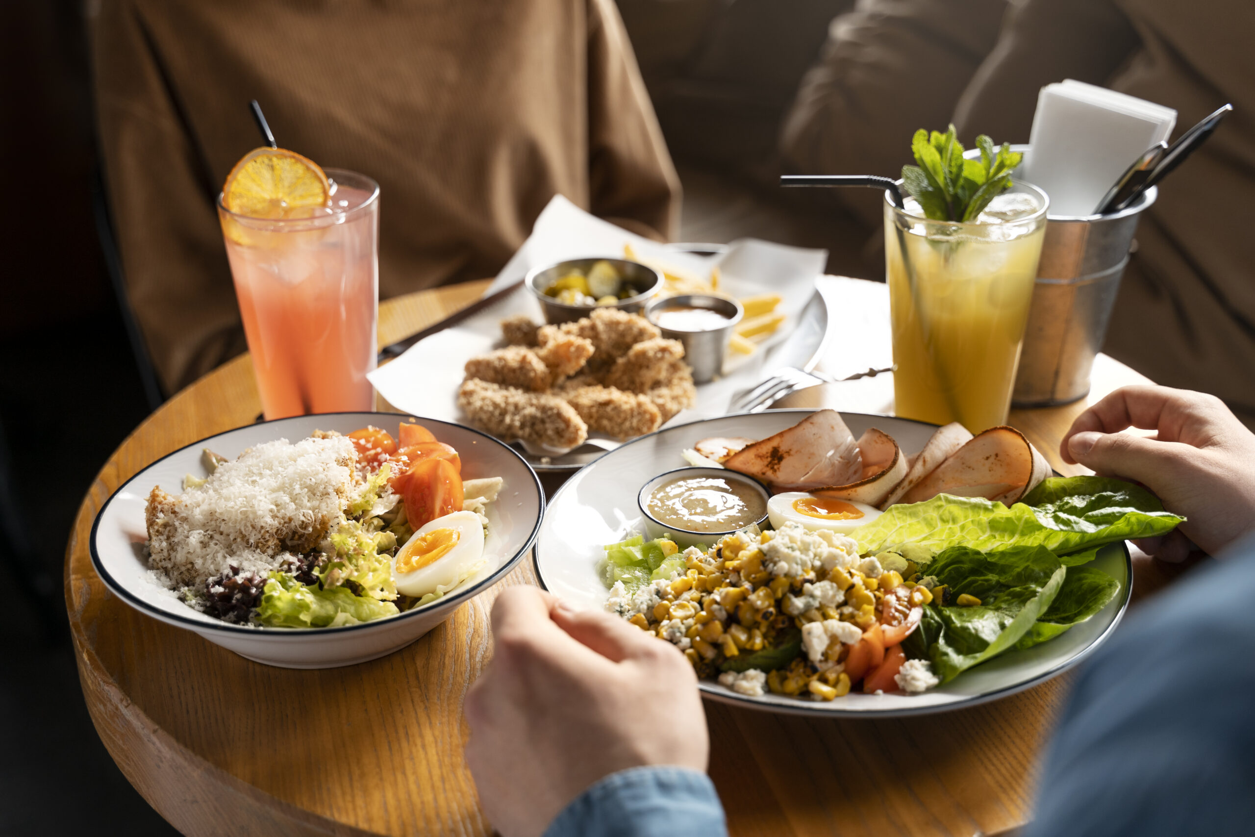 young-adults-enjoying-food - Mabur.co